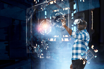 Fototapeta premium Man wearing virtual reality goggles