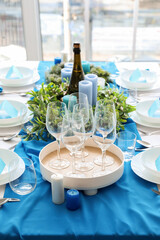 Dining table with beautiful setting for Christmas celebration in room