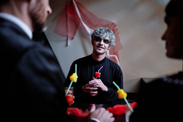 Conversation between friends during Halloween event