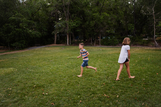 Boy running on grass