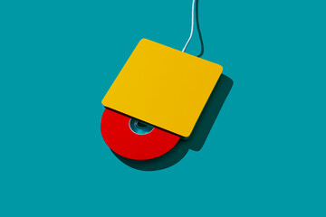 a red cd in a yellow cd reader