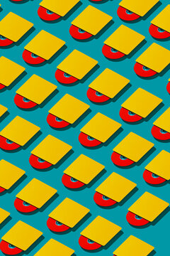 mosaic of yellow cd readers with red cd