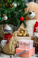 Fototapeta na wymiar Gifts and toys under the Christmas tree.