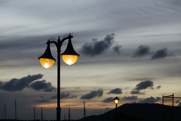 VIntage streetlights on dark street