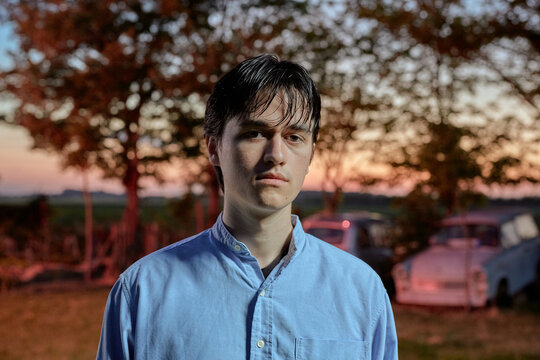 Portrait Of A Serious Man Lit By Strobe Light