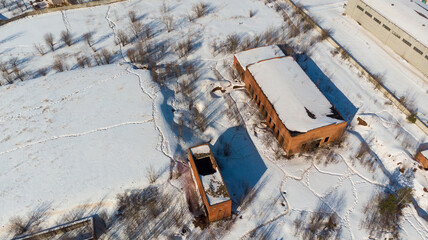 aerial view of unfinished buildings in winter