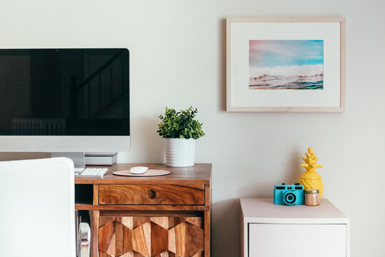 Home office with framed art