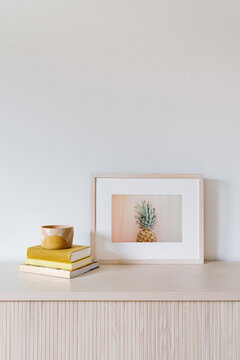 Living room credenza with framed art