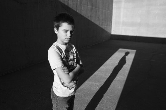 Tough Kid on an Empty Playground
