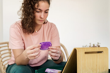 Woman testing condom