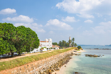 Galle town shoreline leading to lighthouse on Sri Lanka island