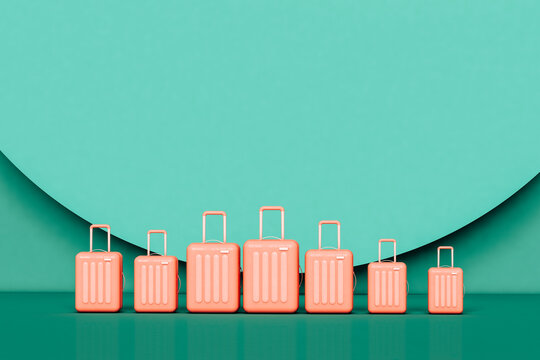 frontal view of pink suitcases.  travel concept