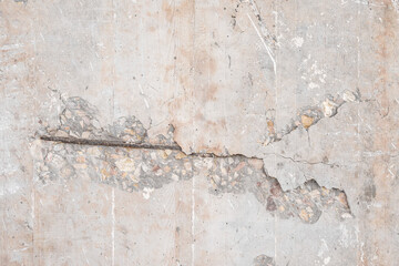 Textured grunge Beige pink background. Old wall with a peeling cover