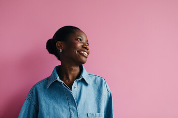 Happy black woman portrait pink background