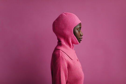 Black woman studio portrait seamless background
