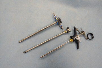 an instrument for performing a prostate resection lies disassembled on a support