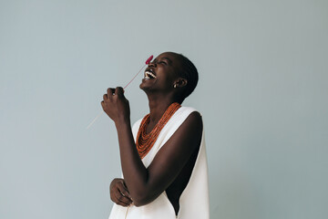 Happy black woman portrait studio seamless background