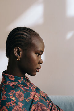 African woman sun portrait in studio