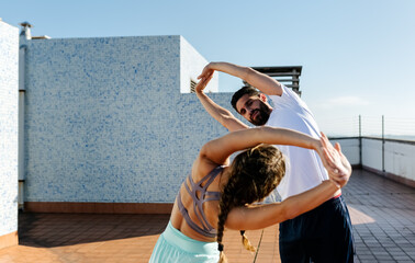 Sports trainer with a fitness trainee