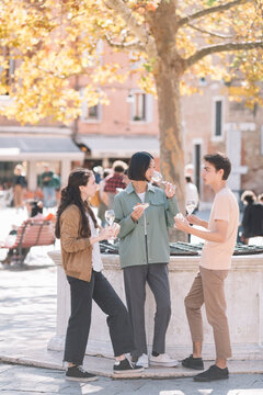 Young Adults Having An Aperitif Outdoors