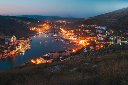 Scenic view of seaside at night 