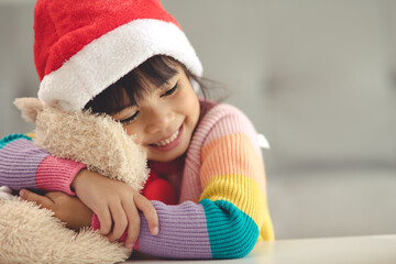 Happy holidays Cute little child opening present. The girl enjoyed the gift.