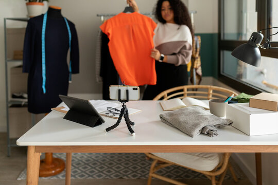 Woman showing clothes online