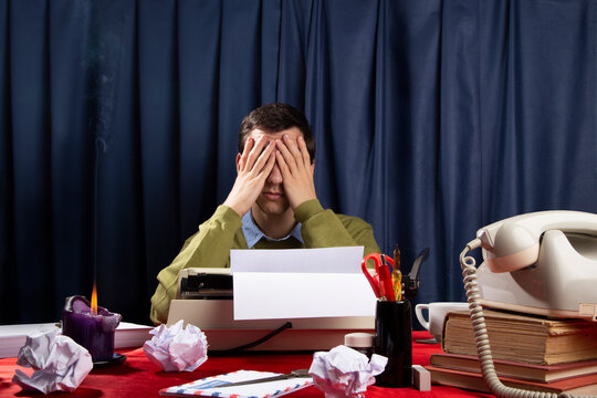 Man at the typewriter machine