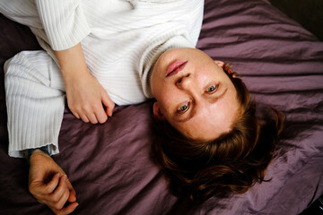 Woman laying on the bed 