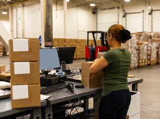 Packing Boxes at warehouse for E- Commerce 