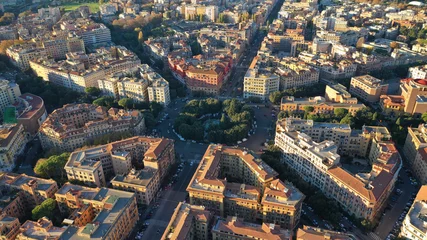 Foto op Plexiglas Aerial drone photo of iconic Piazza Mazzini or Mazzini square in the centre of Prati with beautiful Roman building architecture and small fountain, Rome, Italy © aerial-drone