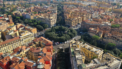 Plakat Aerial drone photo of iconic Piazza Mazzini or Mazzini square in the centre of Prati with beautiful Roman building architecture and small fountain, Rome, Italy