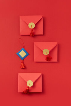 Three red envelopes with tassels