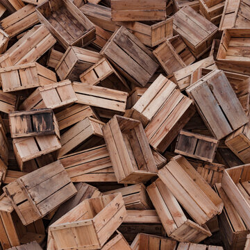 Close-up of stacked wooden boxes.