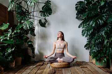 Woman meditating during yoga session