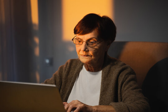 Elderly Woman Using Laptop