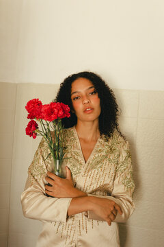 Fashionable Woman With Red Flowers