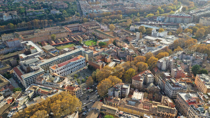 Aerial drone flight over famous Rome district of Trastevere with beautiful Roman architecture, Italy