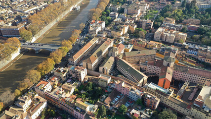 Fototapeta na wymiar Aerial drone flight over famous Rome district of Trastevere with beautiful Roman architecture, Italy