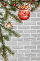 Branches of fir tree with Christmas ornament