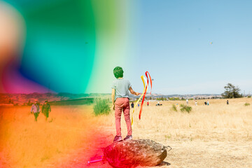 Teen outdoor with colored ribbons 