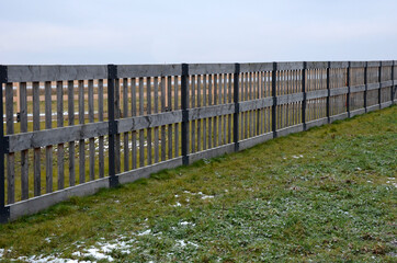 oak log fencing with barrier-free access for seniors and the immobile. safari zoo with a large paddock for large dangerous mammals of the Przewalski's horse. electric fence, tension spring