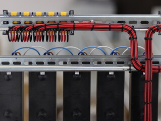 Connecting colored mounting wires in the electrical panel between the modules.