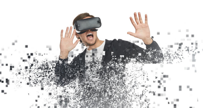 Scared man in VR glasses experiencing virtual reality
