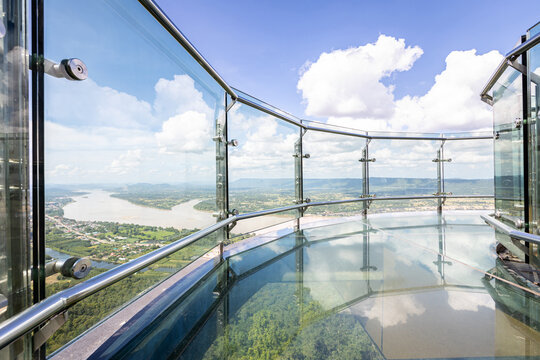 Skywalk,new landmark in Sangkhom district,viewpoint on the glass bridge at Wat Pha Tak Sue,overlooking the beautiful Mekong River view,Sky walk at Temple of Pha Tak Sue,travel in Nong Khai,Thailand