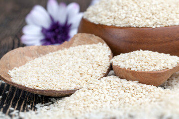white sesame seeds on a wooden table