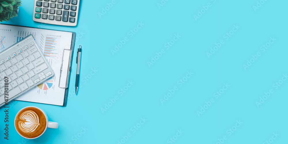 Poster blue office desk table with analysis chart or graph, pen, cup of coffee and calculator. top view wit