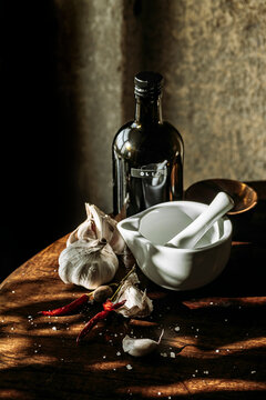 mortar pestle, garlic and olive oil