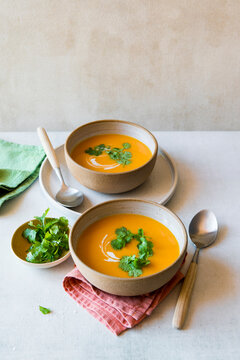 Two servings of butternut vegetable soup