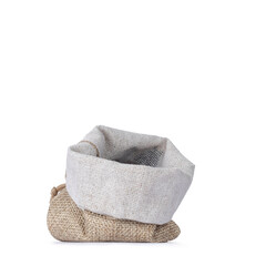 Little woven empty bag with folded edge, standing up. Isolated on a white background.